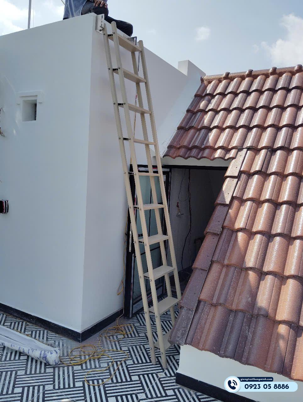 thang gấp lên mái cho biệt thự